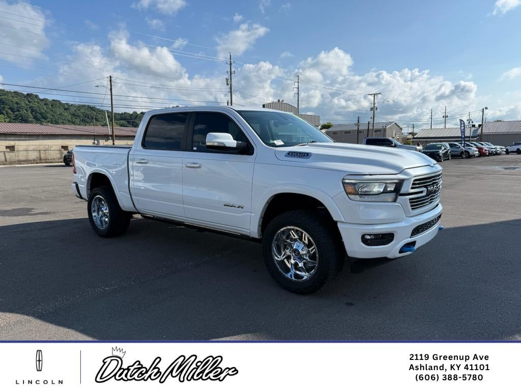 2021 RAM 1500 Laramie in Ivory White Tri-Coat Pearlcoat — front three-quarter view
