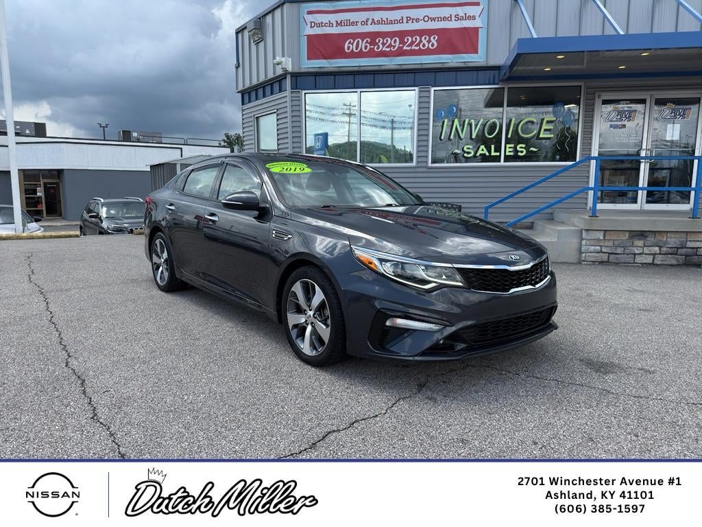 2019 Kia Optima S in Platinum Graphite — front three-quarter view